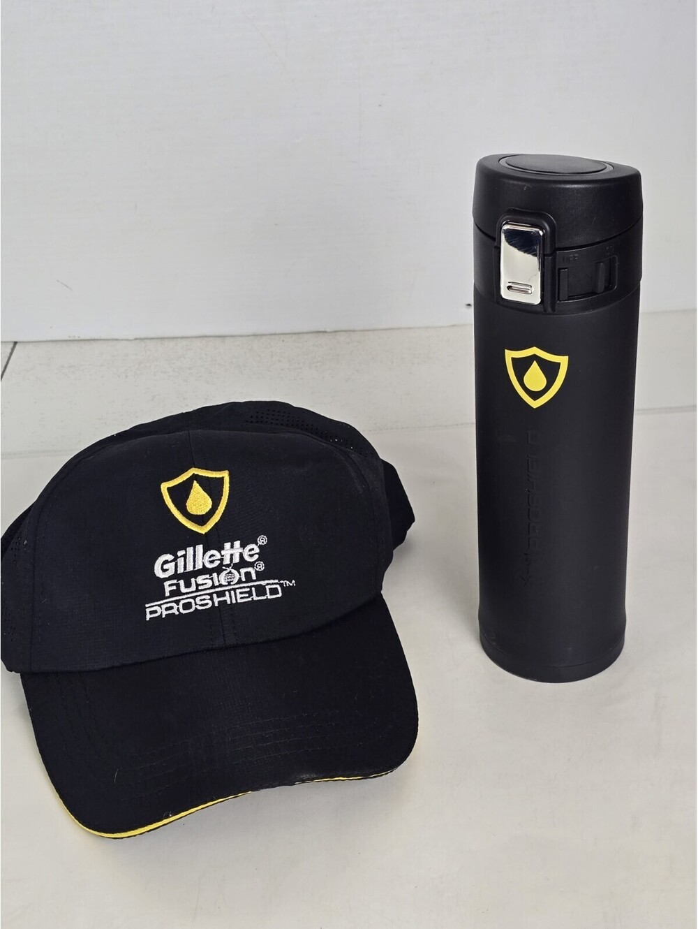 Gillette Fusion Proshield Adjustable Strap Black Hat With Water Bottle Promo